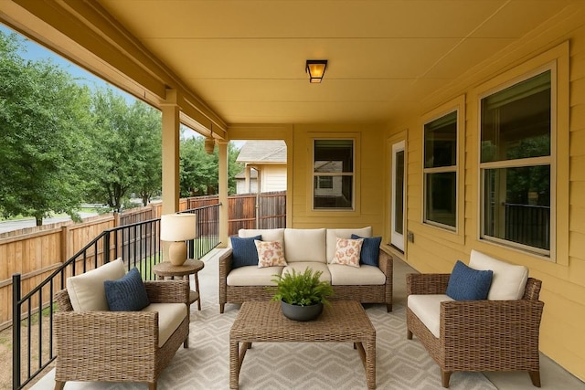 view of patio with fence and an outdoor living space