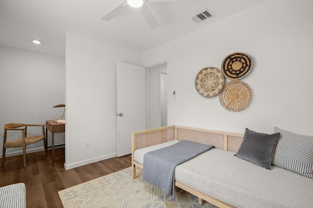 bedroom featuring ceiling fan, recessed lighting, baseboards, wood finished floors, and visible vents