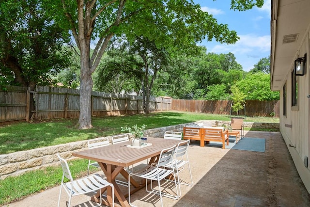 view of patio with a fenced backyard, outdoor lounge area, and outdoor dining space