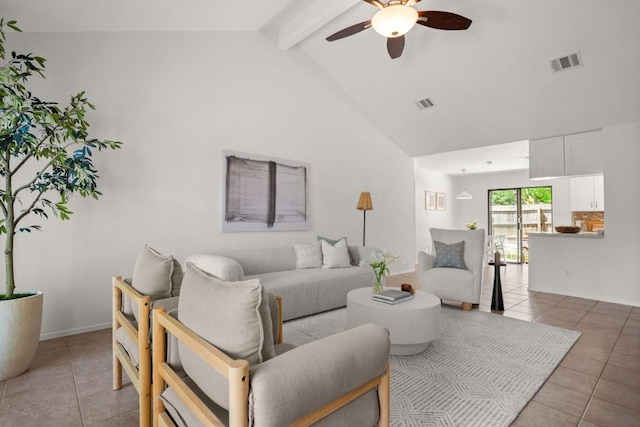 living room with visible vents, a ceiling fan, and light tile patterned flooring