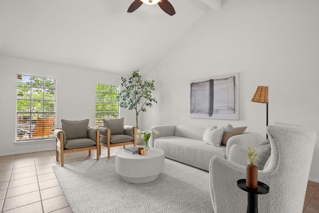 tiled living room with high vaulted ceiling, ceiling fan, baseboards, and beam ceiling