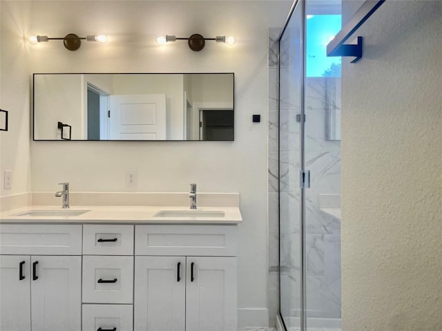 1811 Webberville Rd Unit 2101, Austin, TX 78721 - bathroom with a marble finish shower and double vanity
