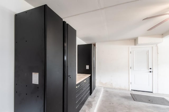 interior space featuring unfinished concrete flooring