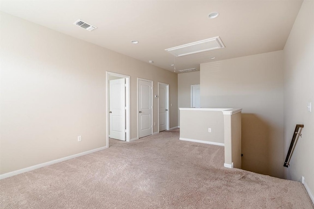 2880UNIT3401 Donnell Dr Unit 3401, Round Rock, TX 78664 - spare room featuring attic access, light colored carpet, baseboards, and recessed lighting