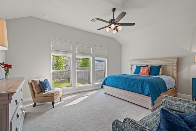 171 William Clayton Dr, Buda, TX 78610 - bedroom featuring vaulted ceiling, carpet, and ceiling fan