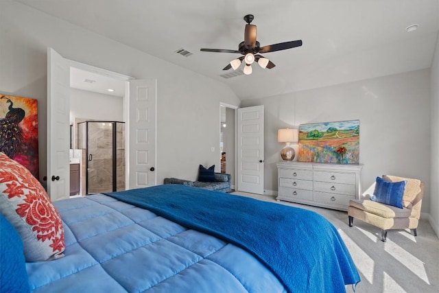 carpeted bedroom with ceiling fan, visible vents, and lofted ceiling