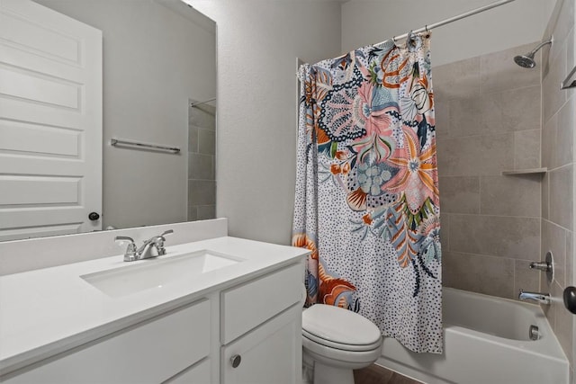 full bath featuring vanity, toilet, and shower / tub combo