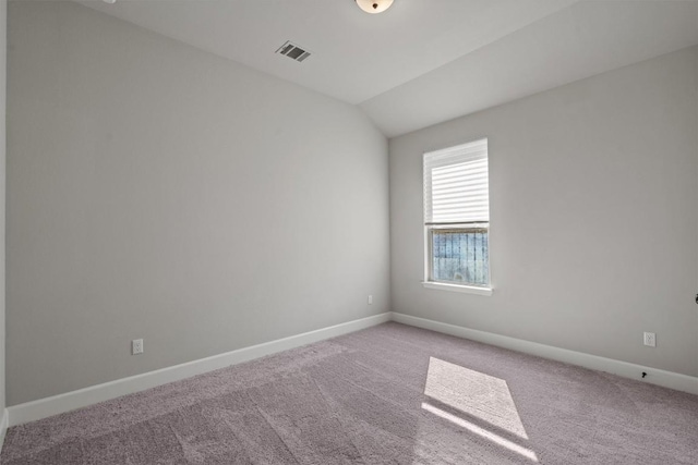 171 William Clayton Dr, Buda, TX 78610 - unfurnished room with carpet floors and vaulted ceiling