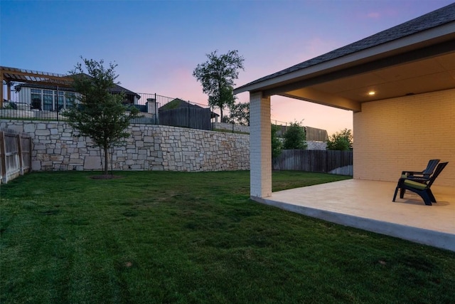 view of yard featuring a patio and a fenced backyard