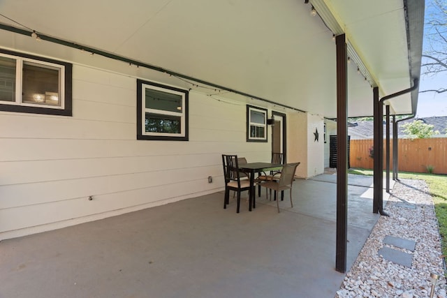 713 Buckingham Pl, Austin, TX 78745 - view of patio / terrace with fence and outdoor dining space