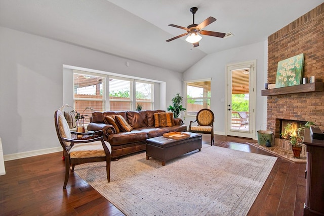 living room featuring baseboards, ceiling fan, lofted ceiling, and dark wood-style floors