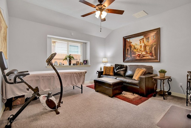 carpeted office featuring baseboards, visible vents, a ceiling fan, and lofted ceiling