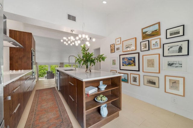 kitchen with open shelves, a sink, and modern cabinets