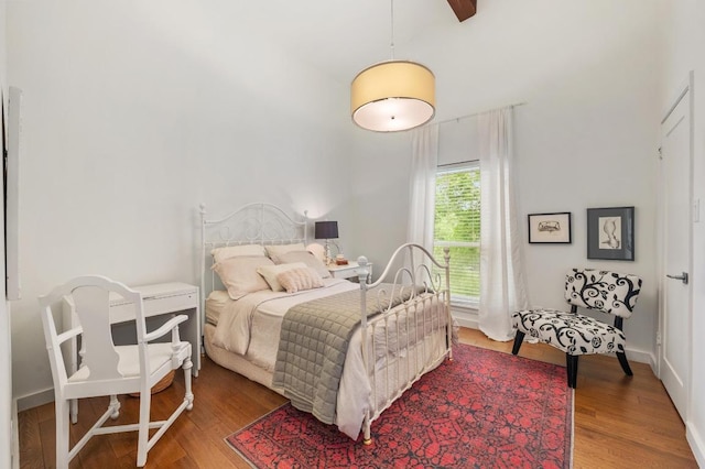 bedroom with wood finished floors