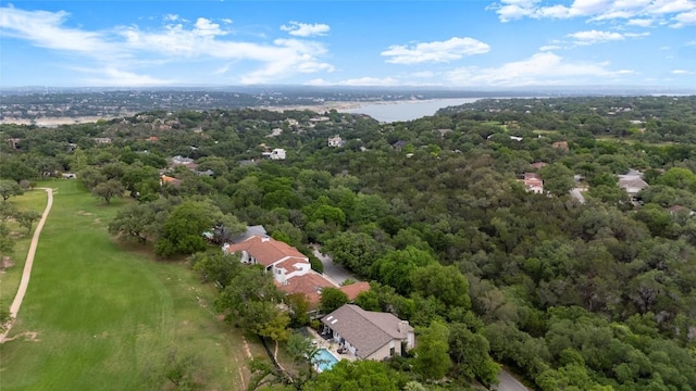 aerial view featuring a water view and a view of trees