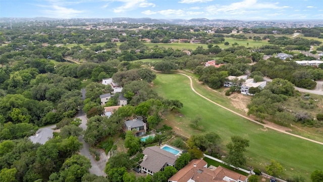 aerial view with a residential view and view of golf course