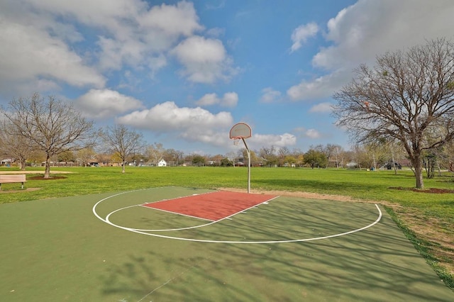 view of basketball court featuring community basketball court and a yard