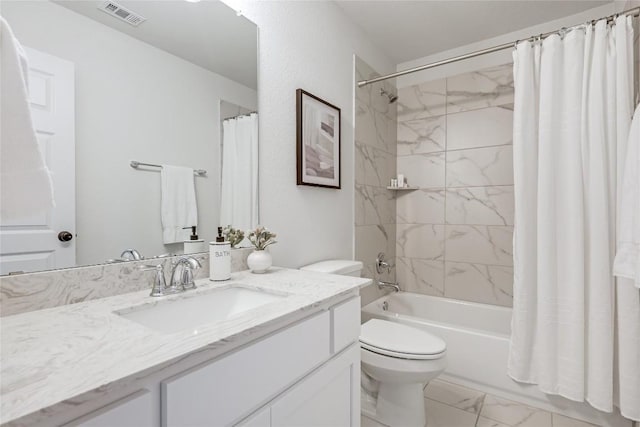 full bathroom with vanity, toilet, shower / bathtub combination with curtain, marble finish floor, and visible vents