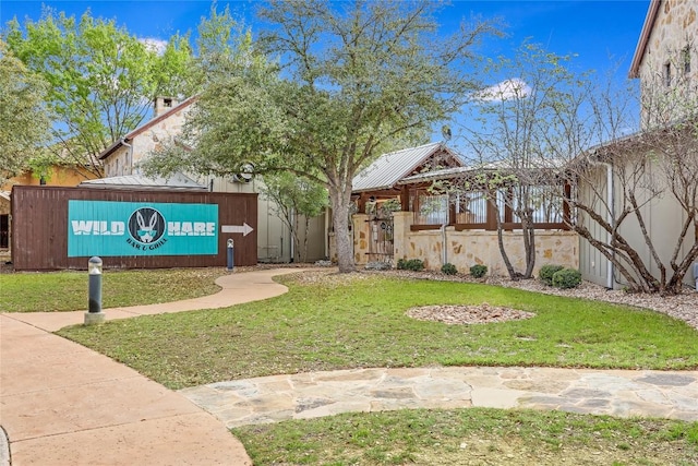 exterior space featuring a lawn