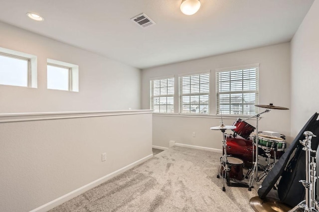 game room with visible vents, baseboards, and carpet floors