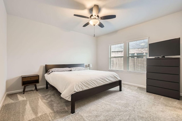 bedroom featuring baseboards, carpet, and ceiling fan