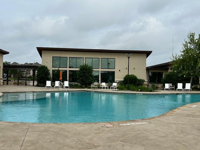 pool with a patio area