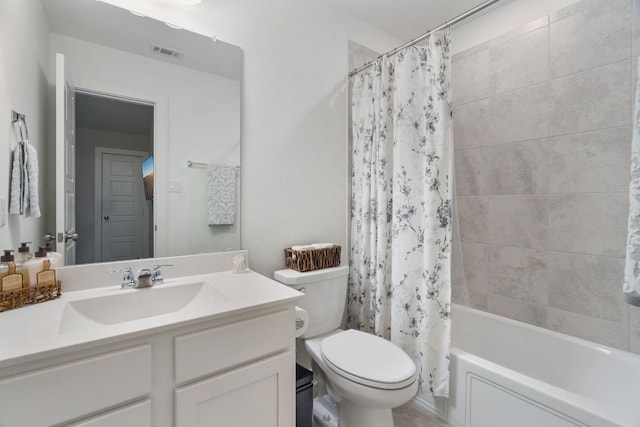173 Venti Cv, Georgetown, TX 78628 - bathroom featuring vanity, shower / tub combo with curtain, toilet, and visible vents