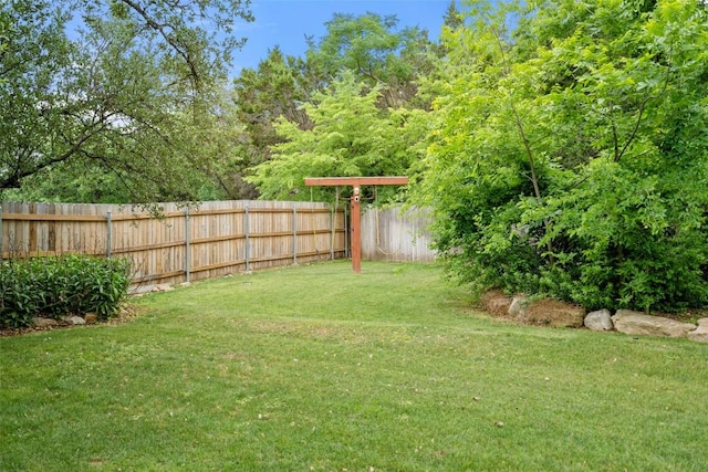 view of yard with fence