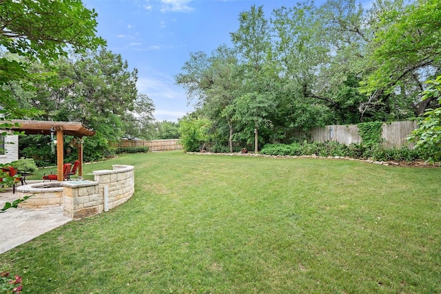 view of yard with a fenced backyard and a patio area
