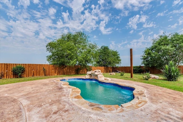 view of pool with a lawn, a patio, a fenced in pool, and a fenced backyard
