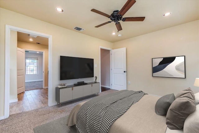 bedroom with visible vents, recessed lighting, and carpet floors