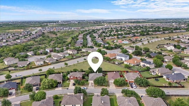 drone / aerial view with a residential view