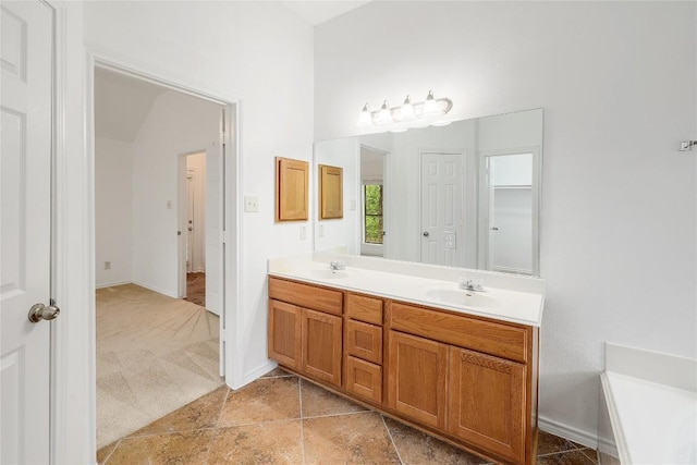 813 Westbury Ln, Georgetown, TX 78633 - full bath with double vanity and baseboards