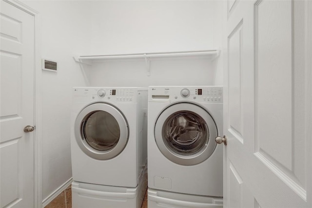laundry area featuring laundry area and separate washer and dryer