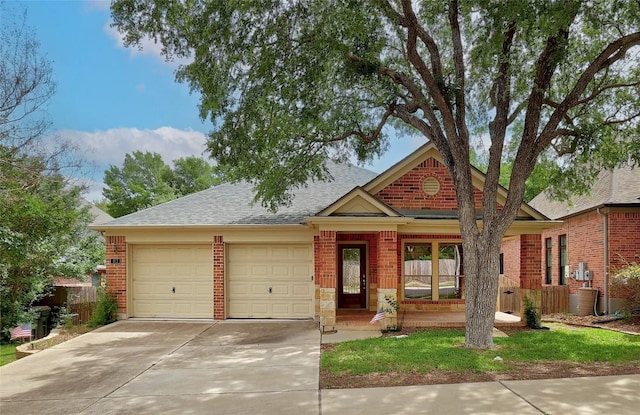 view of front of house featuring brick siding, a garage, roof with shingles, and concrete driveway
