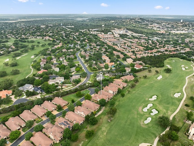 aerial view featuring a residential view and view of golf course