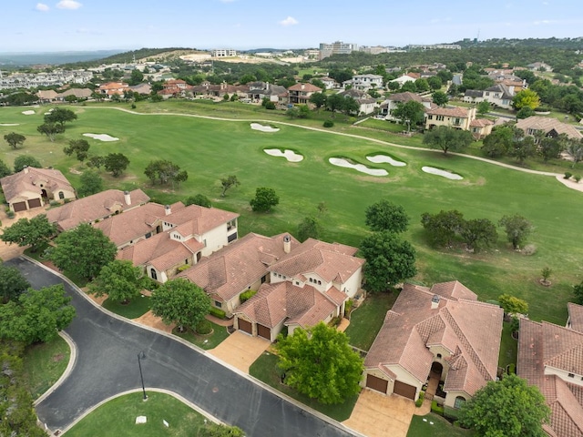 birds eye view of property featuring golf course view and a residential view