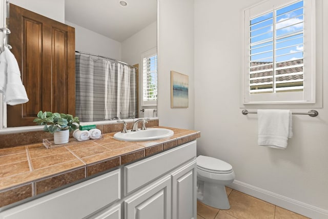 15 Borello Dr, Austin, TX 78738 - full bath with vanity, tile patterned floors, and a shower with shower curtain