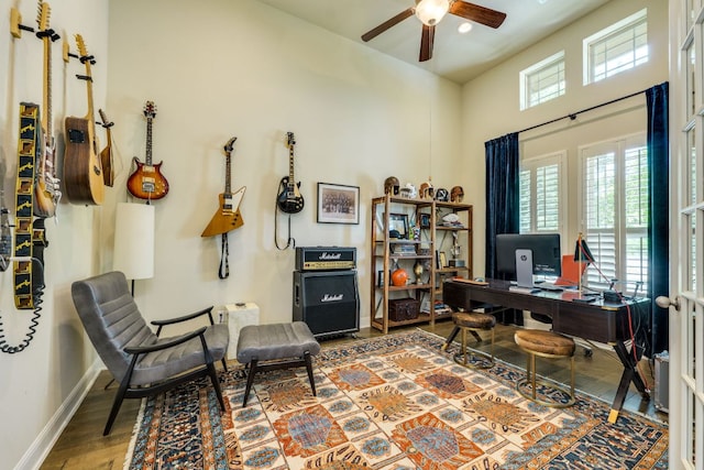 4101 Front Range Ln, Austin, TX 78732 - office featuring baseboards, a towering ceiling, ceiling fan, and wood finished floors