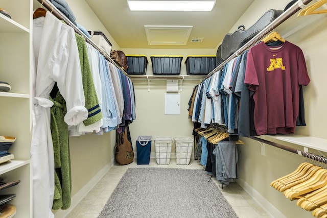 4101 Front Range Ln, Austin, TX 78732 - walk in closet with attic access and tile patterned floors