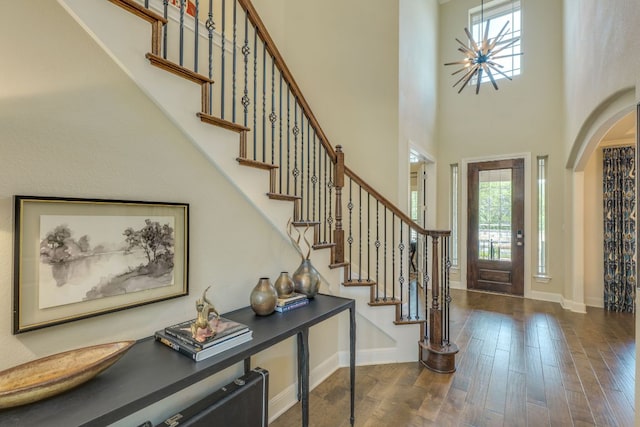 4101 Front Range Ln, Austin, TX 78732 - foyer entrance featuring baseboards, plenty of natural light, stairway, and dark wood-type flooring