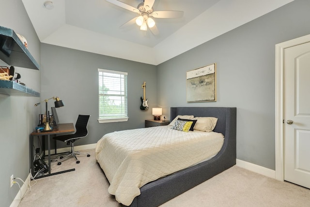 4101 Front Range Ln, Austin, TX 78732 - carpeted bedroom featuring a tray ceiling, baseboards, and a ceiling fan