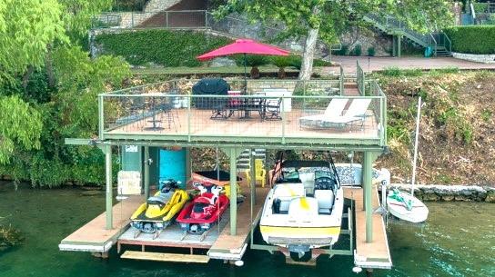 exterior space with a boat dock and a water view