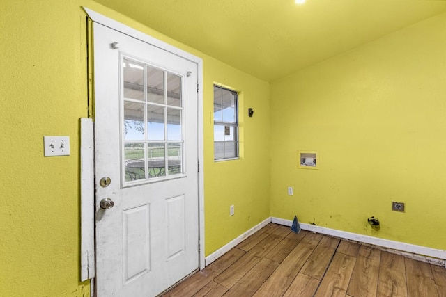 washroom with laundry area, wood finished floors, baseboards, hookup for a washing machine, and hookup for an electric dryer