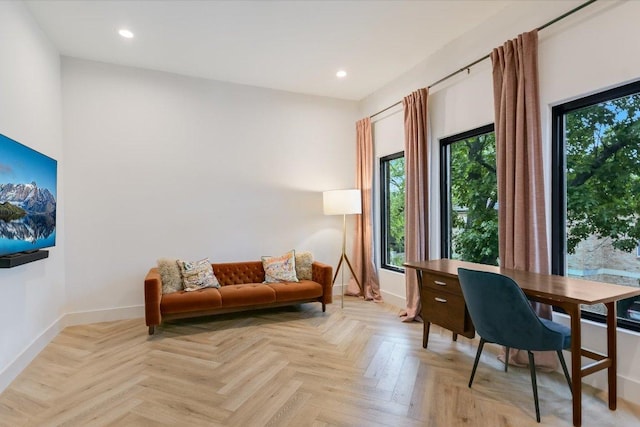 office with recessed lighting and baseboards