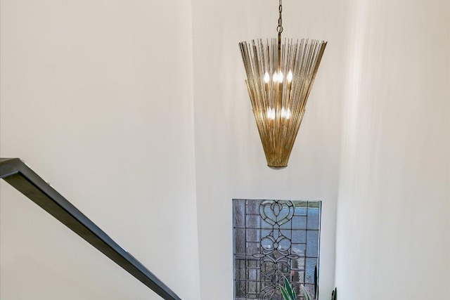 details with an inviting chandelier