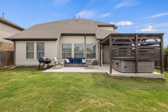 back of property with roof with shingles, a patio area, a hot tub, an outdoor hangout area, and a fenced backyard