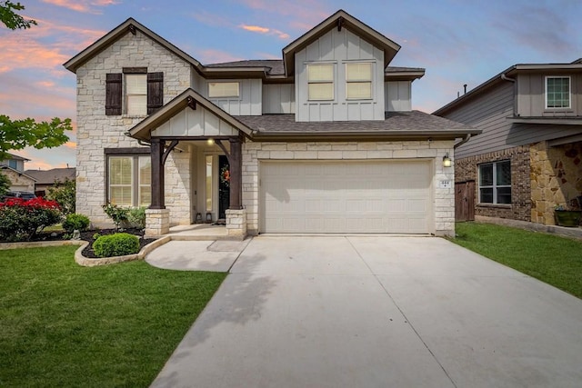 view of front of property featuring a front lawn, stone siding, a garage, board and batten siding, and driveway