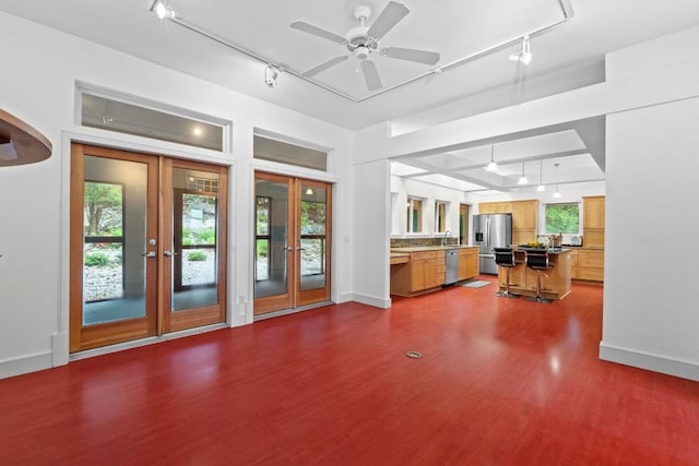 3800 Laurel Ledge Ln, Austin, TX 78731 - kitchen featuring track lighting, french doors, stainless steel appliances, and plenty of natural light