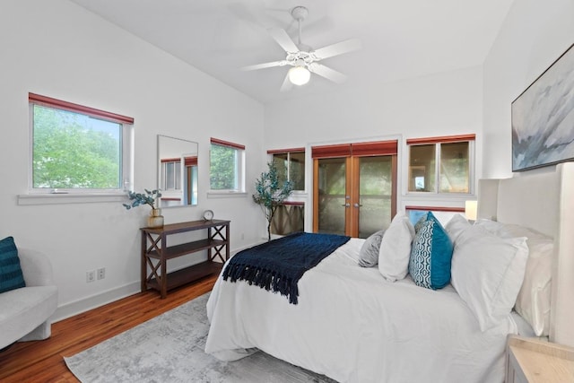 3800 Laurel Ledge Ln, Austin, TX 78731 - bedroom featuring french doors, wood finished floors, baseboards, and a ceiling fan